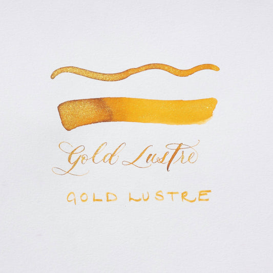 Golden Lustre gold shimmer ink strokes with handwritten Gold Lustre label
