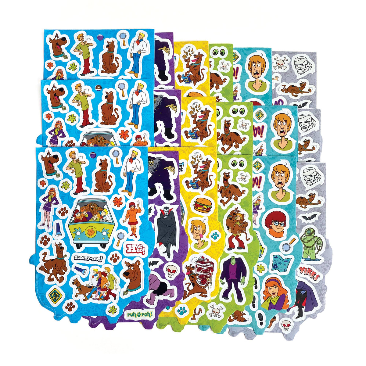 Multiple Scooby-Doo sticker sheets in blue, purple, green, yellow, and white