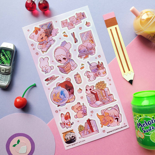 Sticker sheet featuring cartoon characters, rabbits, and desk items with pink accents