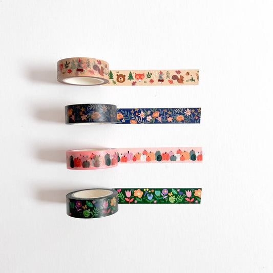 Set of four washi tape rolls with floral, cactus, and forest motifs