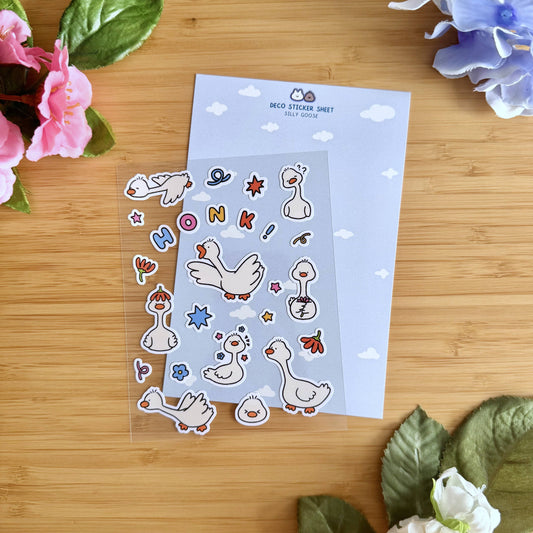 Light blue sticker sheet with white-bordered card, cartoon geese and “HONK” lettering