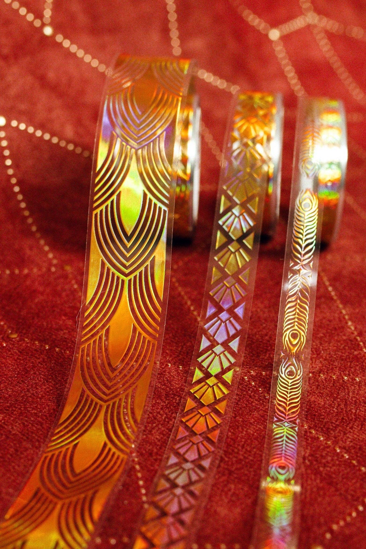 Gold art deco transparent tape rolls with iridescent geometric and wave designs