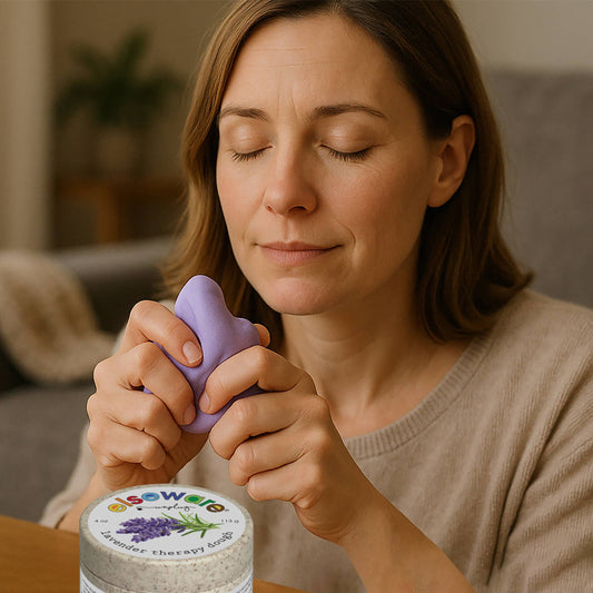 Lavender therapy dough in hands, purple molded piece