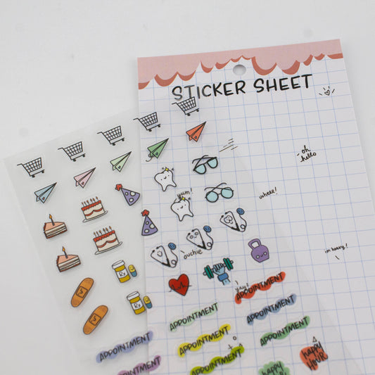 Clear planner sticker sheet with small icons like carts, food, hearts, and glasses