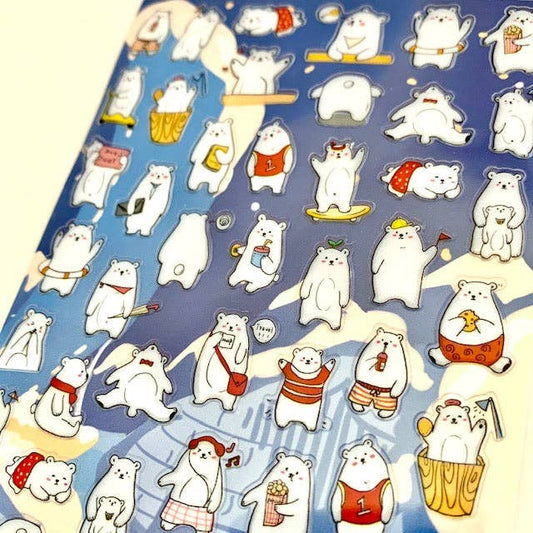 Sheet of polar bear stickers featuring assorted poses and accessories, close-up