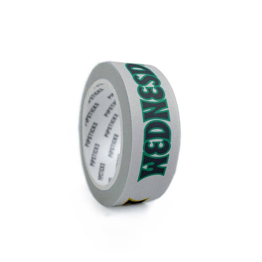 Washi tape roll showing gray backing and teal PIPSTICKS lettering on the side