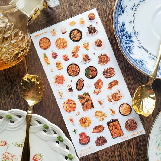 Food buffet sticker sheet on table with pizzas, cakes, and beverage stickers