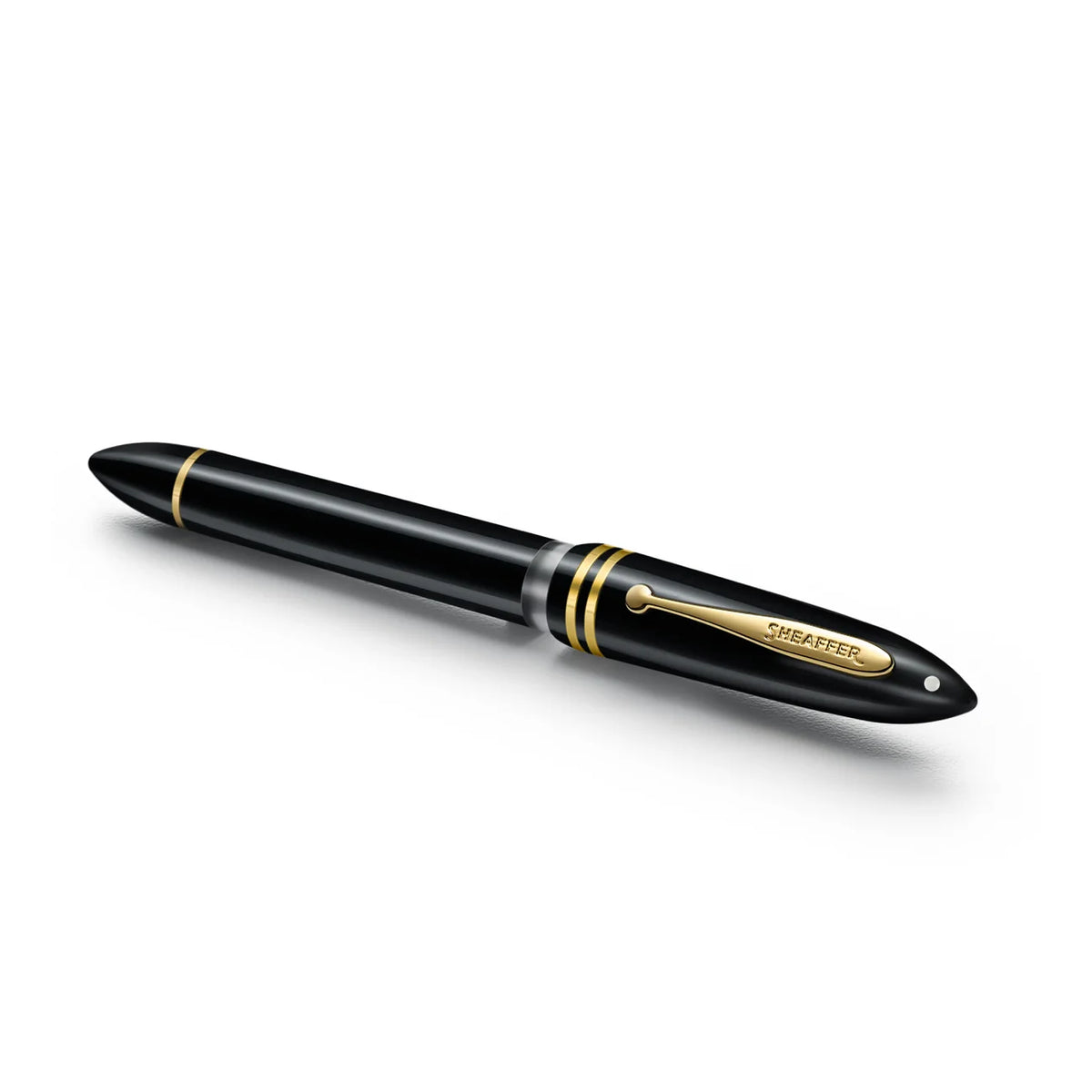 Glossy black fountain pen with gold cap band and clip