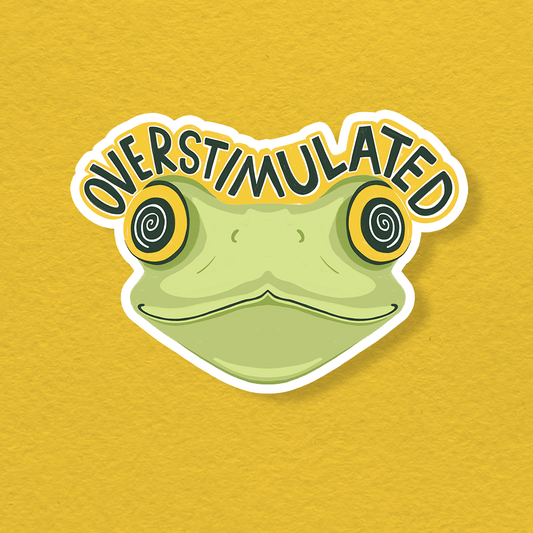 Green cartoon frog vinyl sticker with spiral eyes and 'OVERSTIMULATE' headline