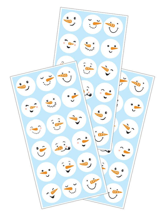 Set of snowman face sticker sheets with round, smiling faces on blue backgrounds