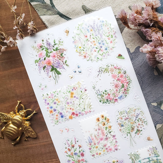 Pastel floral sticker sheet with die-cut butterflies, bouquets, and flower clusters
