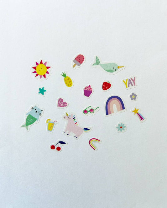 Assorted whimsical washi stickers featuring animals, fruits, rainbows, and small icons