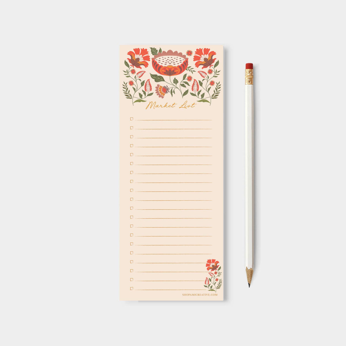 Fall grocery list notepad with floral pumpkin design and lined checklist, shown with pencil