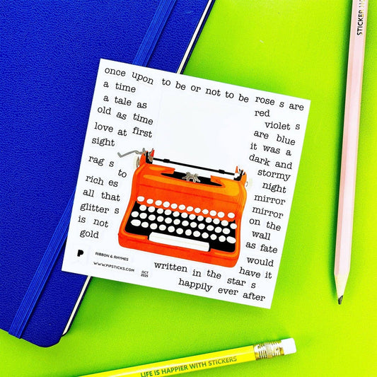 Sticker sheet showing orange typewriter on blue and green notebooks