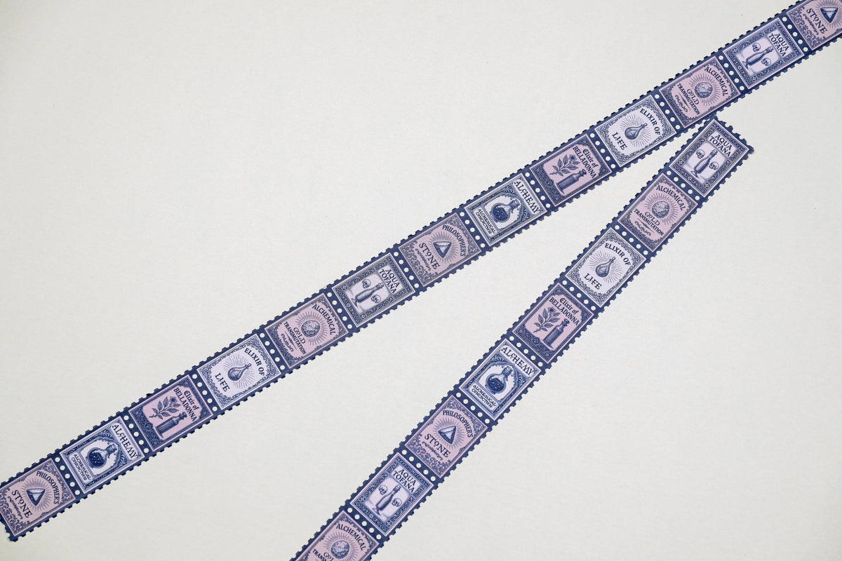Blue stamp-pattern washi tape strips, close-up of repeating icons