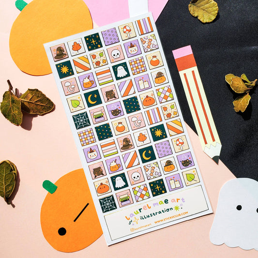 Halloween sticker sheet with pumpkins, cats, ghosts, bats, and patterned square designs.