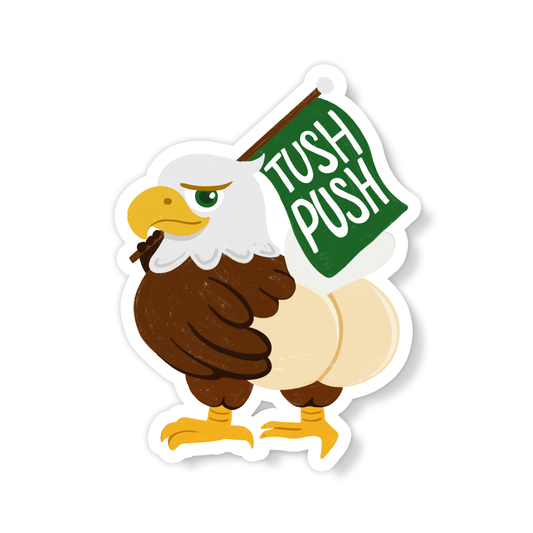 Vinyl football fan sticker of a cartoon eagle holding a green “TUSH PUSH” sign