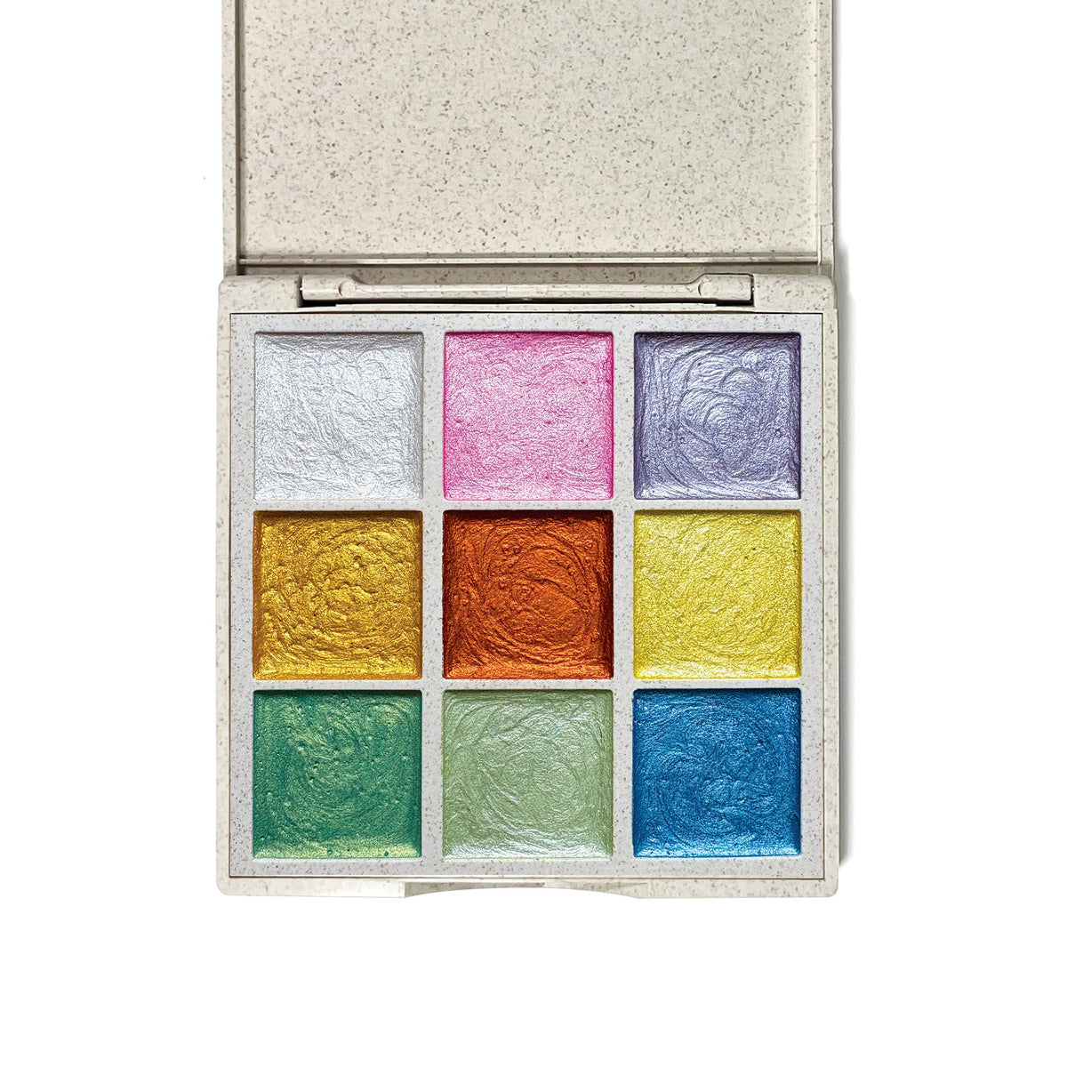 Metallic watercolor palette open with nine pastel metallic pans: pink, gold, blue