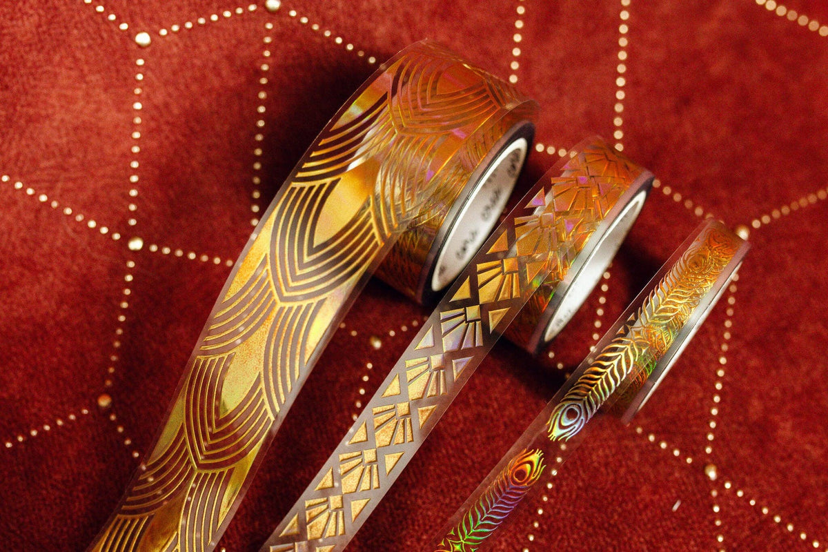 Gold art deco transparent tape rolls with ornate geometric and wave patterns
