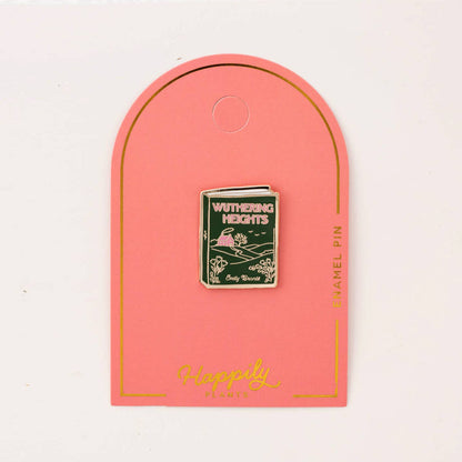Enamel book pin with 'Wuthering Heights' cover, centered on pink 'Happy' card