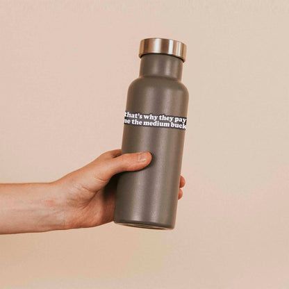 Funny quote sticker on gray bottle: 'that's why they pay me the medium bucks'
