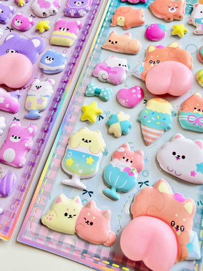 Two animal squishy butt sticker sheets showing pink and purple cat butt and heart stickers