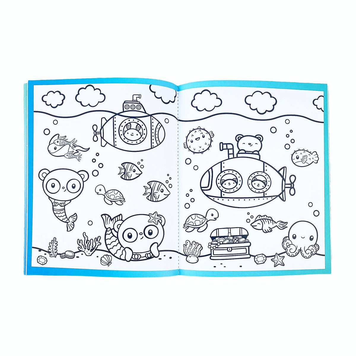 Sea life sticker book open to black-and-white sea animal drawing pages