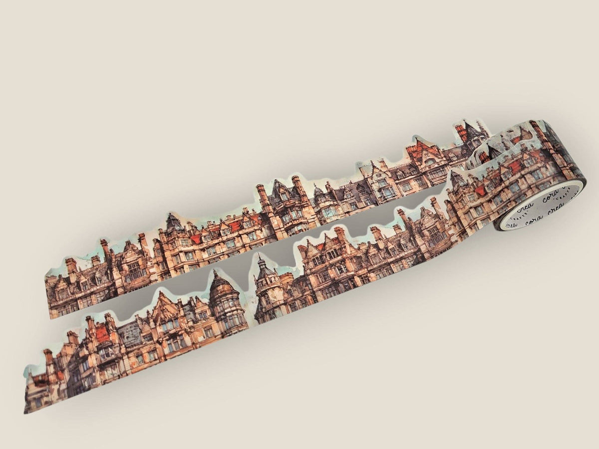Decorative cutout tape with illustrated city skyline and red-orange buildings