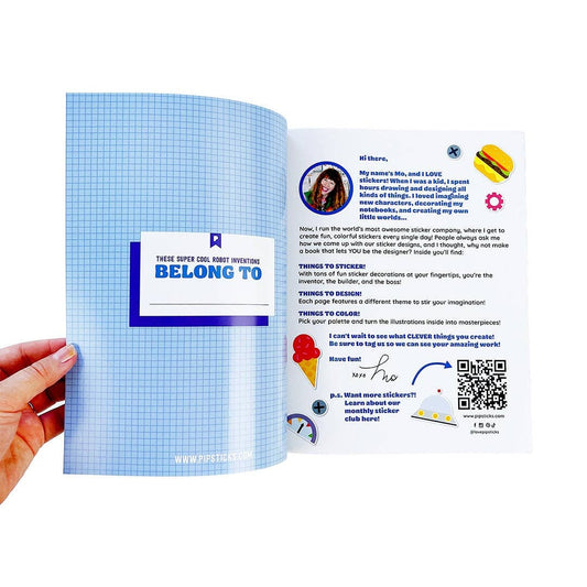 Sticker book spread with robot sticker sheet instructions on blue graph-style pages