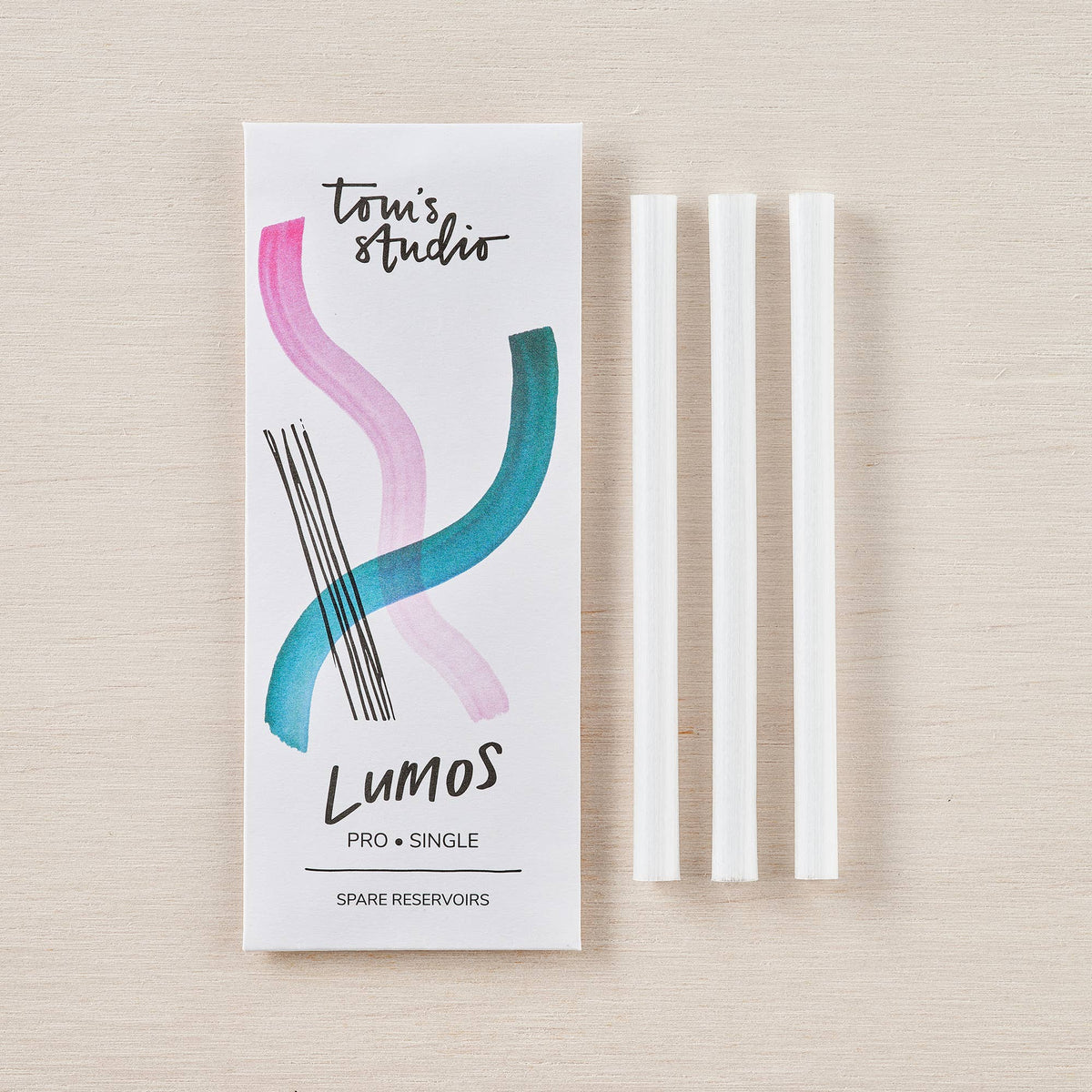 Spare ink reservoirs box with five white refill tubes