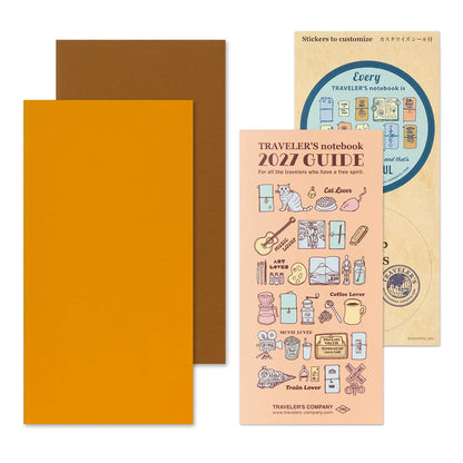 Travelers notebook covers in dark brown and mustard yellow with sticker sheet