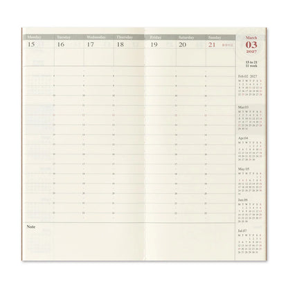 Cream planner page with month grid and weekly date layout for 2027
