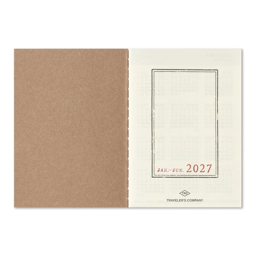 Passport-size diary cover with tan outer and 'JAN–JUN 2027' label