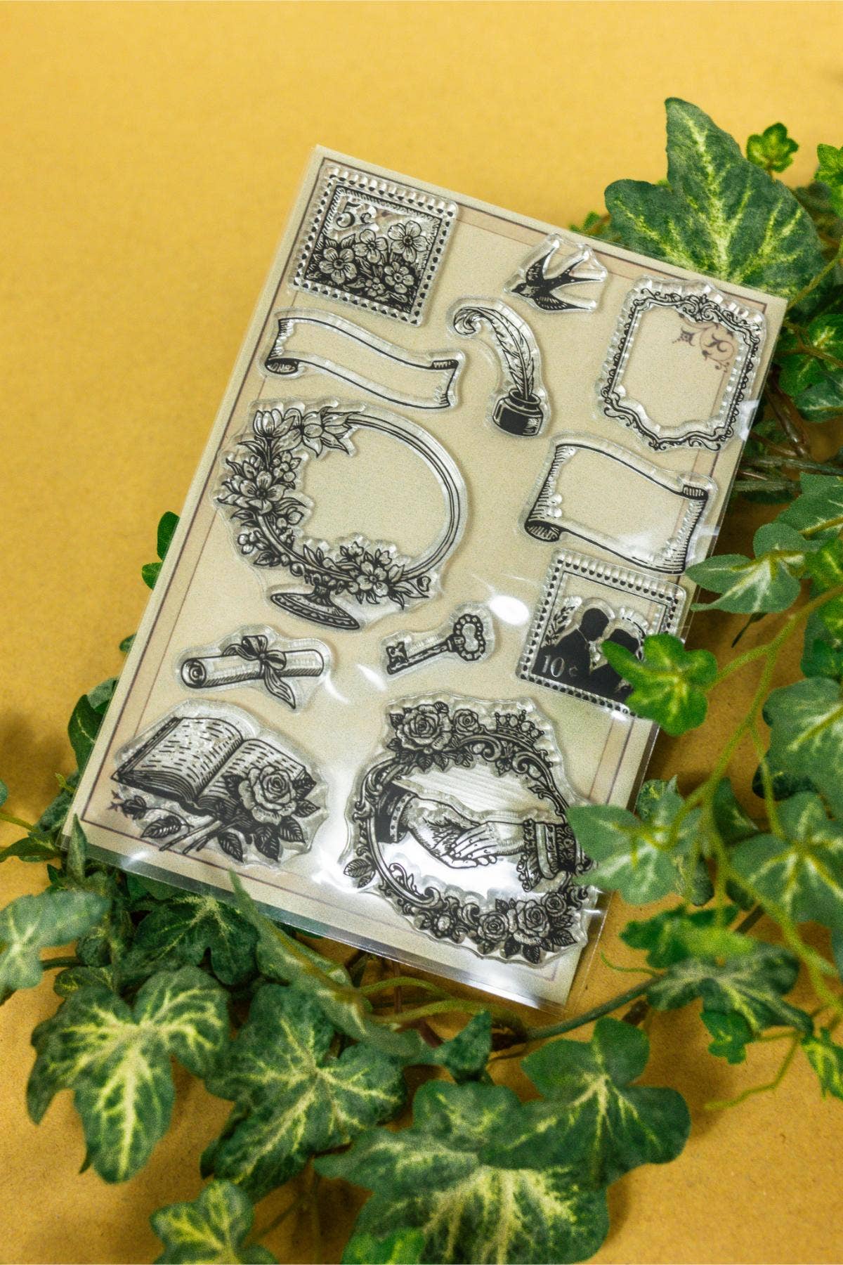 Clear stamp sheet showing ornate scrollwork, borders, and decorative frame shapes