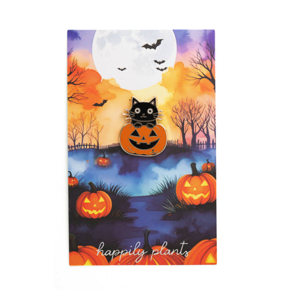Halloween cat pumpkin pin artwork on a colorful greeting card