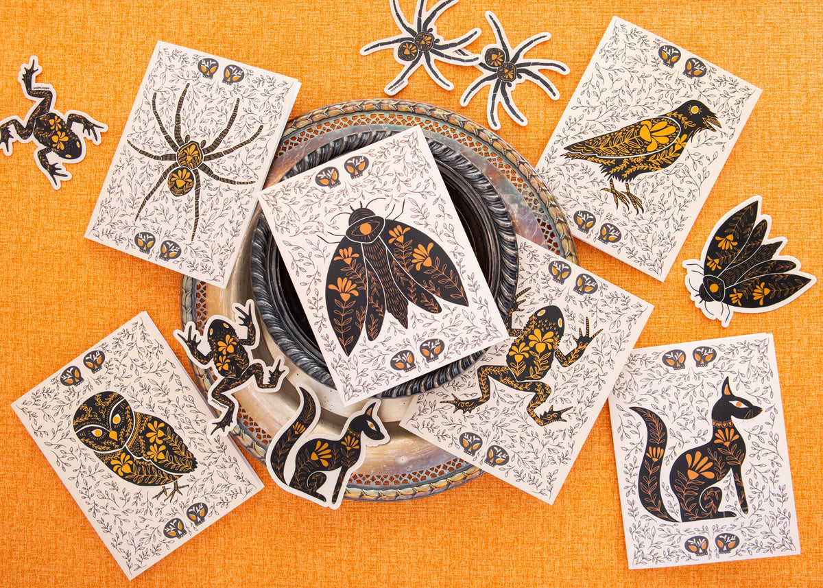 Egyptian folk-art vinyl stickers featuring cats, birds, insects, and floral motifs