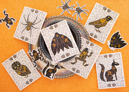 Egyptian folk-art vinyl stickers featuring cats, birds, insects, and floral motifs
