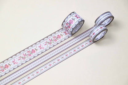Washi tape set with two long rolls featuring lilac floral stripe and lace trim