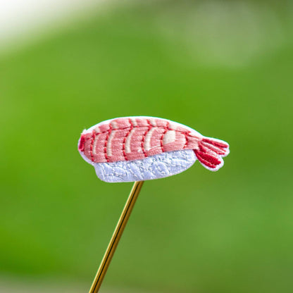 Embroidered salmon sushi iron-on patch with red-striped topping