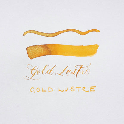Golden Lustre gold shimmer ink strokes with handwritten Gold Lustre label