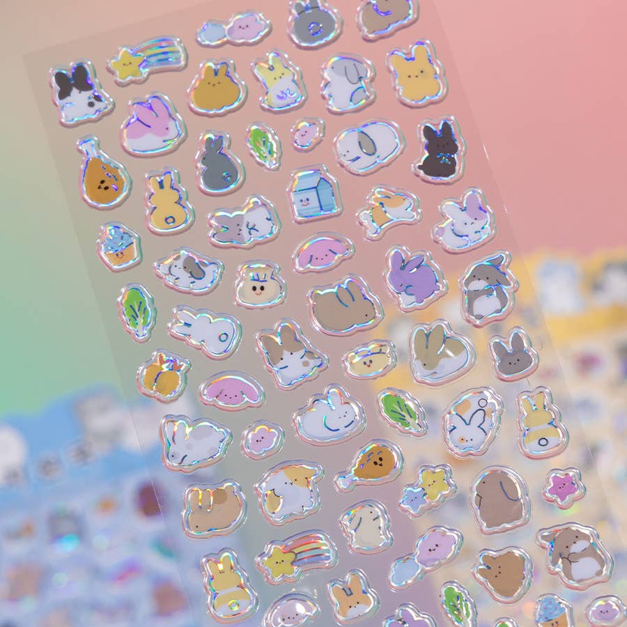 Holographic animal sticker sheet with small bunny, cat, and heart icons on a pink background