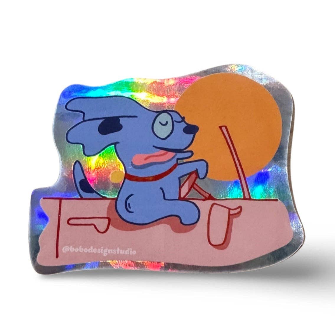 Holographic dog driving sticker, blue dog with goggles holding steering wheel