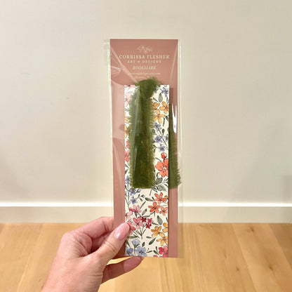 Packaged floral double-sided bookmark with multicolor flowers and green velvet ribbon loop