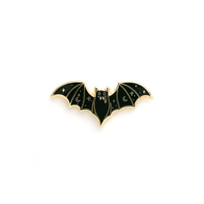 Vampire bat enamel lapel pin with black wings, gold border, small red eyes
