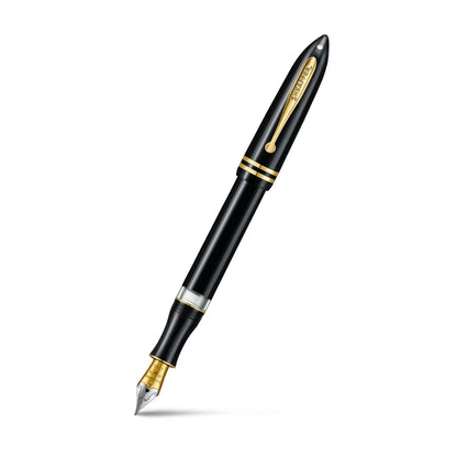 Black fountain pen with gold trim and pointed nib