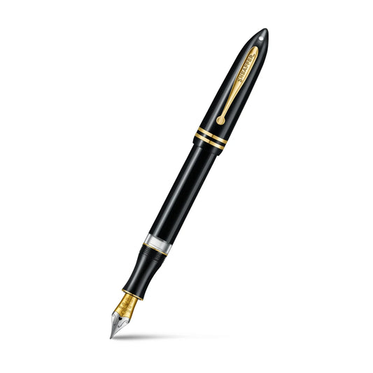 Black fountain pen with gold trim and pointed nib