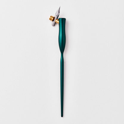 Teal flourish calligraphy pen with angled nib and gold accent ring