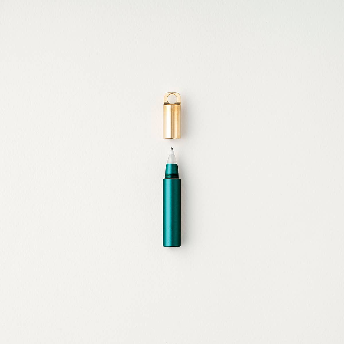 Refillable travel pen, teal barrel with gold clip and cap