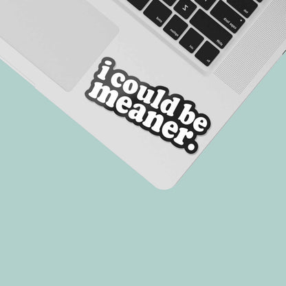 Funny quote sticker reading "i could be meaner." on a laptop lid
