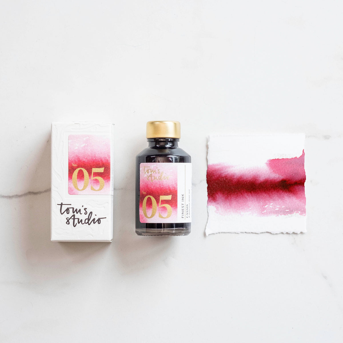 Cassis fountain pen ink bottle with 05 label, boxed set and ink swatch card